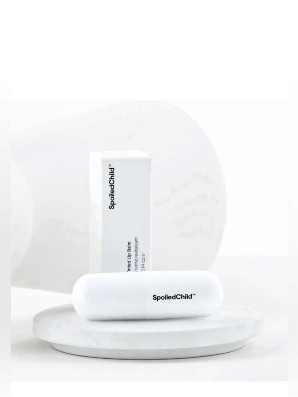 Spoiled Conditioning Tinted Lip Balm in White Packaging